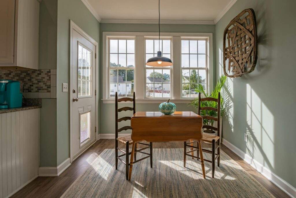 A cozy kitchen with a table and chairs perfect for Simi Valley real estate.